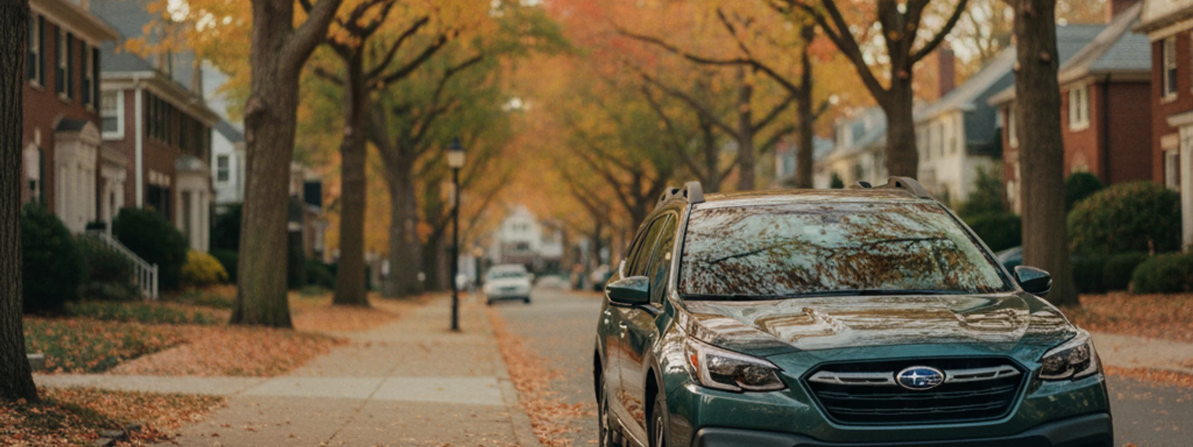 Subaru Outback parked on a leafy Princeton street in autumn
